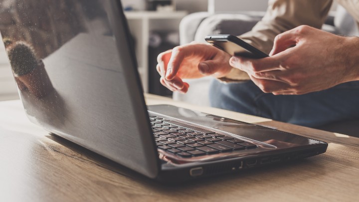 can-you-email-a-check_man-using-laptop